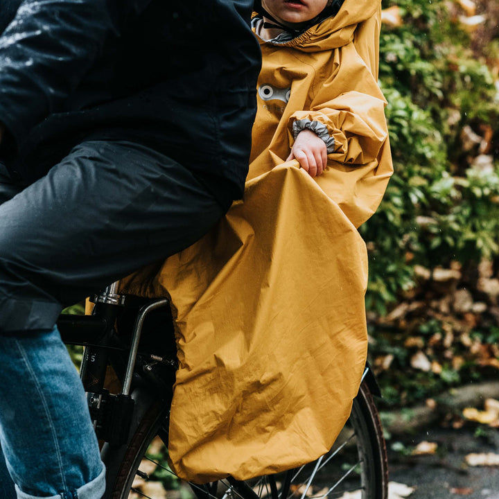 Rainette Regenponcho Fiets Yellow, one size fits all voor kinderen van 9 maanden tot 4 jaar, met capuchon voor helm, reflecterende strips, en waterdichte naden