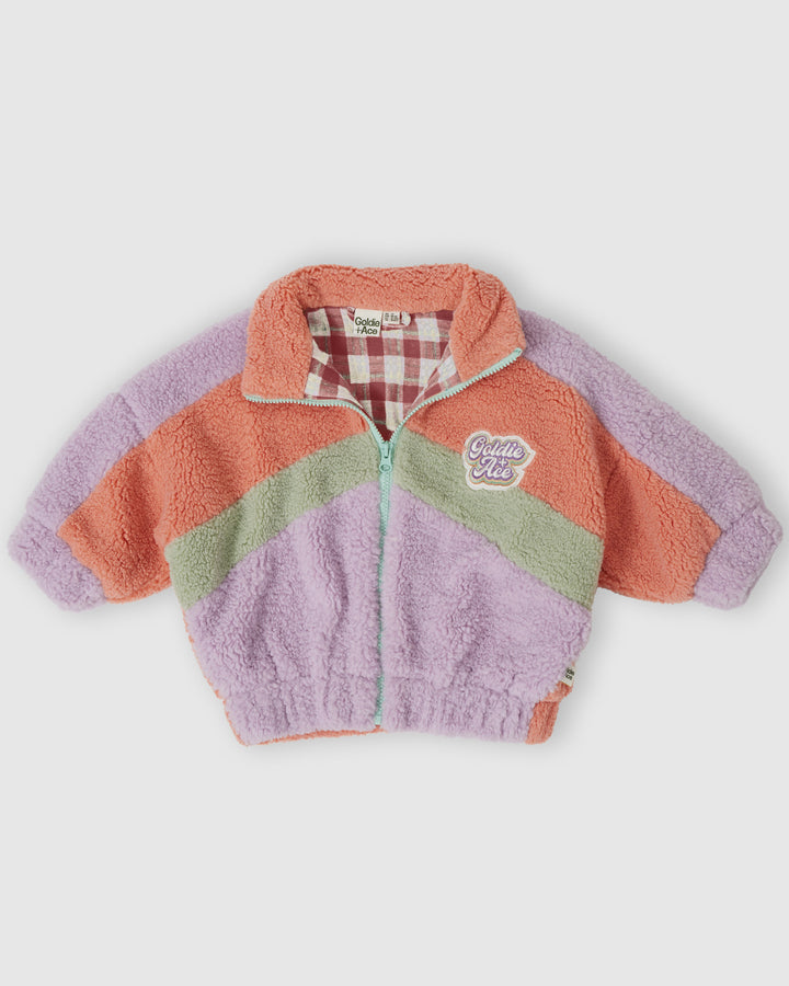 Goldie + Ace sherpa jas in lila, perzik en mint met retro badge