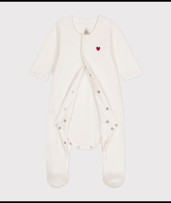 Zachte Petit Bateau babybody met hartje in marshmallowkleur