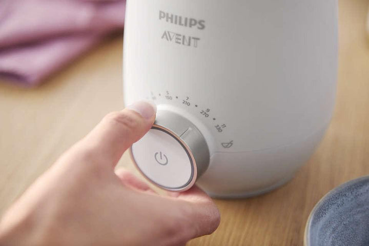 Avent Flesverwarmer Premium met slimme temperatuurregeling voor snelle en veilige opwarming van melk en babyvoeding.