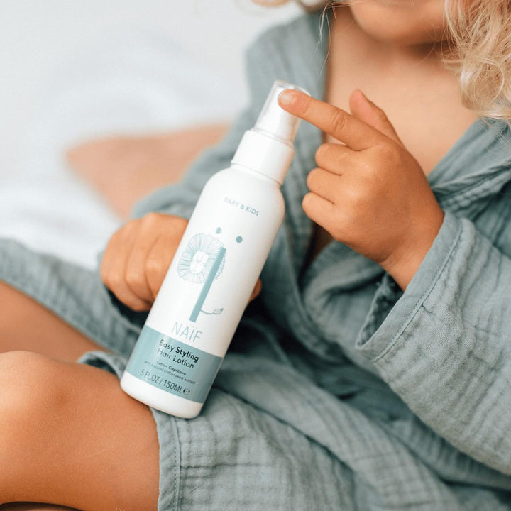 Naïf haarlotion 150ml voor baby en kind tegen klitten en pluis met katoenzaadolie