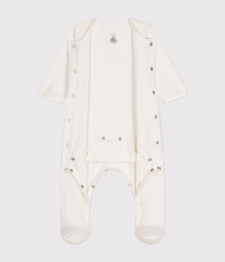 Zachte Petit Bateau babybody met hartje in marshmallowkleur