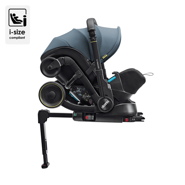 Doona ISOFIX Basis voor de Doona X autostoel, geïnstalleerd in een auto met kleurindicatoren voor veilige bevestiging.
