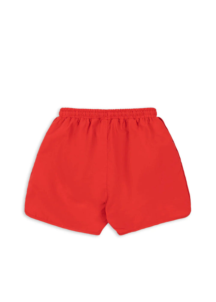Rode zwemshort voor kinderen van Konges Slojd, model Mitch, ideaal voor strand en zwembad