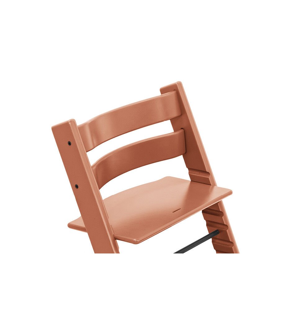Stokke Tripp Trapp Terracotta kinderstoel in Scandinavisch design, verstelbaar en duurzaam.