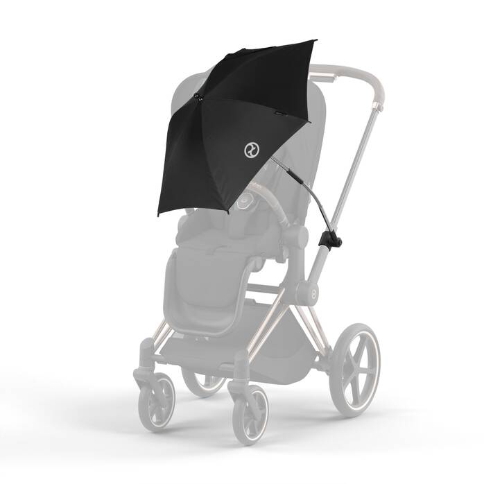 Zwarte Cybex parasol bevestigd aan een kinderwagen, beschermt tegen zon