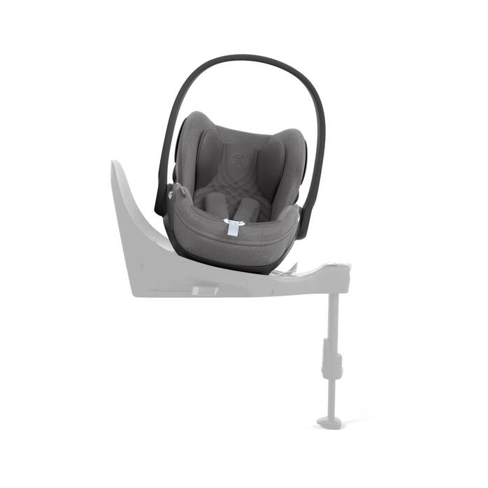 Cybex Cloud T i-Size baby-autostoel in Mirage Grey , getoond in liggende positie met ISOFIX basis.