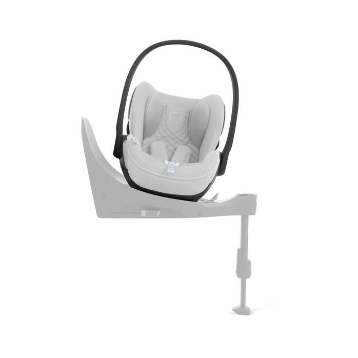 Cybex Cloud T i-Size baby-autostoel in platinum white , getoond in liggende positie met ISOFIX basis.