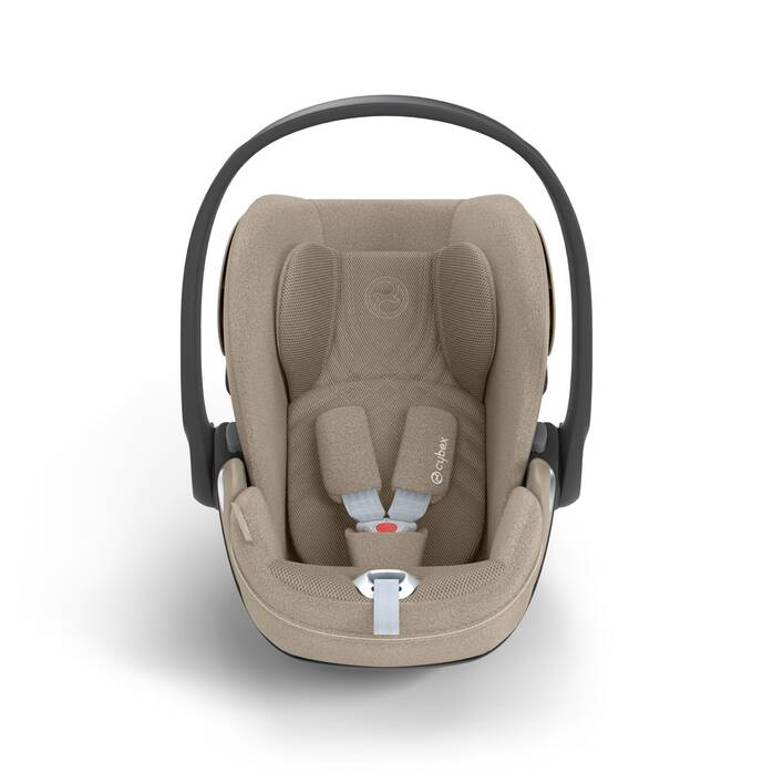Cybex Cloud T i-Size baby-autostoel in cozy beige, getoond in liggende positie met ISOFIX basis.