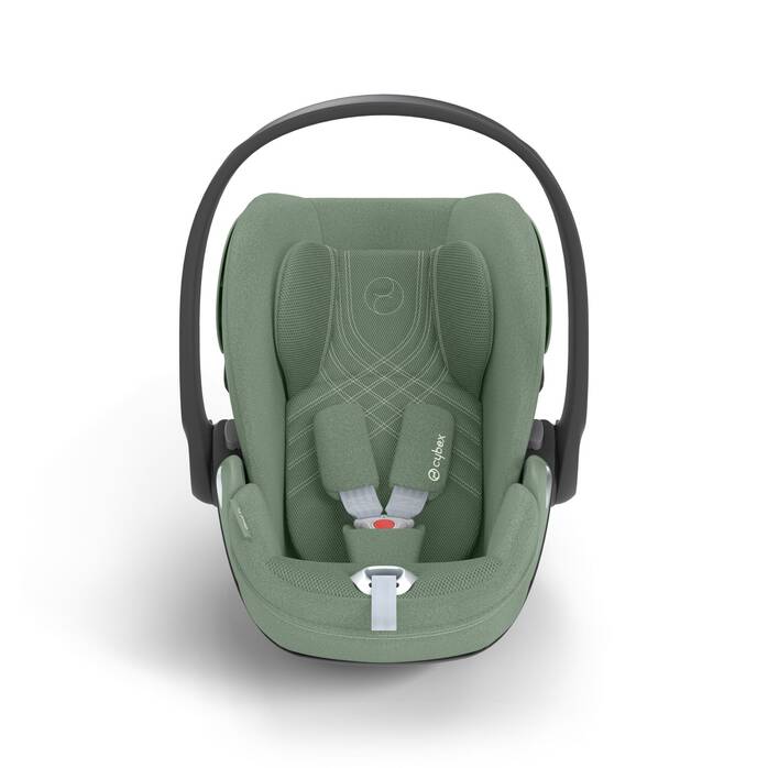 Cybex Cloud T i-Size baby-autostoel in leaf green, getoond in liggende positie met ISOFIX basis.