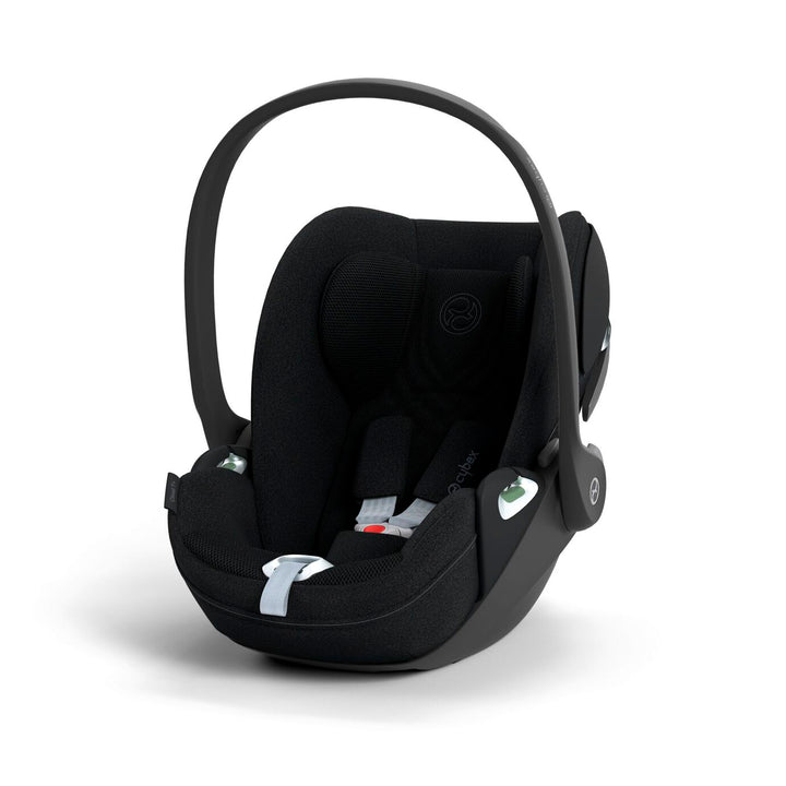 Cybex Cloud T i-Size baby-autostoel in zwart, getoond in liggende positie met ISOFIX basis.