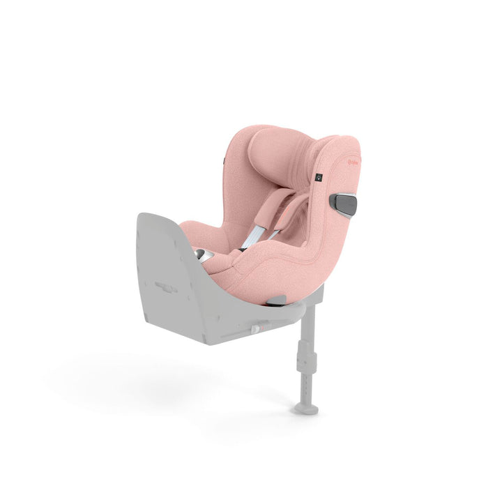 Cybex Sirona T i-Size Plus autostoel in Peach Pink, uitgerust met 360° rotatie en geavanceerde veiligheidsvoorzieningen