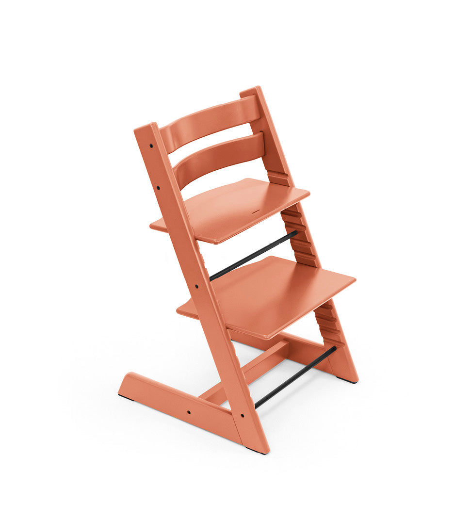 Stokke Tripp Trapp Terracotta kinderstoel in Scandinavisch design, verstelbaar en duurzaam.