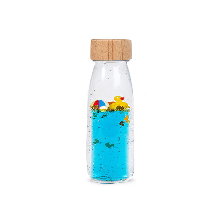 Petit Boum Sensorische Fles Eend met fluorescerende vloeistof en glitters