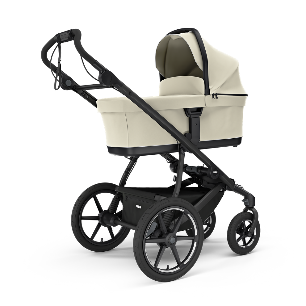 Thule Urban Glide 4-wiel buggy in beige met grote wielen en comfortabele zitje