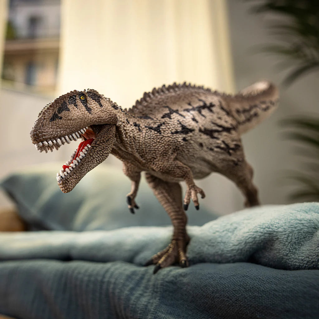 Schleich speelfiguur Carcharodontosaurus, grijze hagedissenhuid, blauwe plakken, scherpe tanden