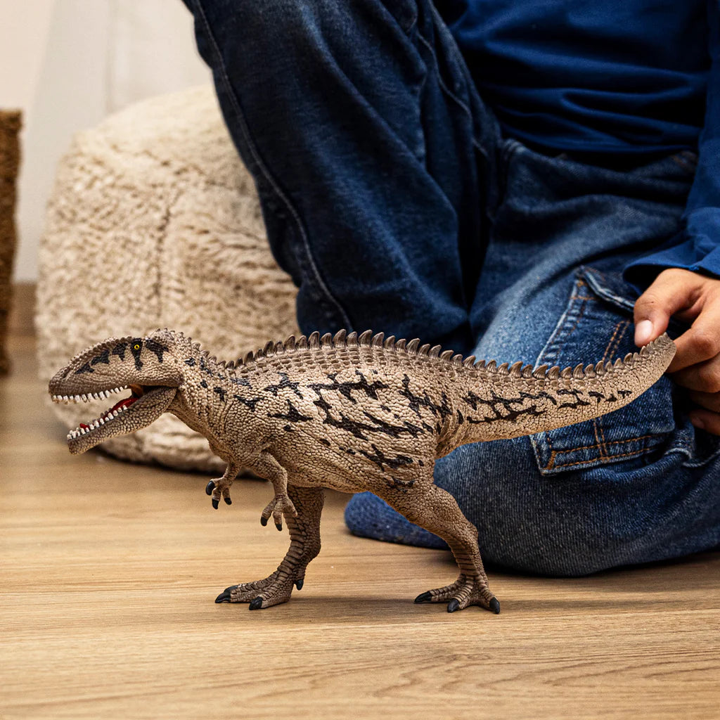 Schleich speelfiguur Carcharodontosaurus, grijze hagedissenhuid, blauwe plakken, scherpe tanden