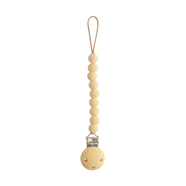 Mushie Fopspeenketting Hera Soft Pale Yellow – stijlvolle siliconen fopspeenhouder