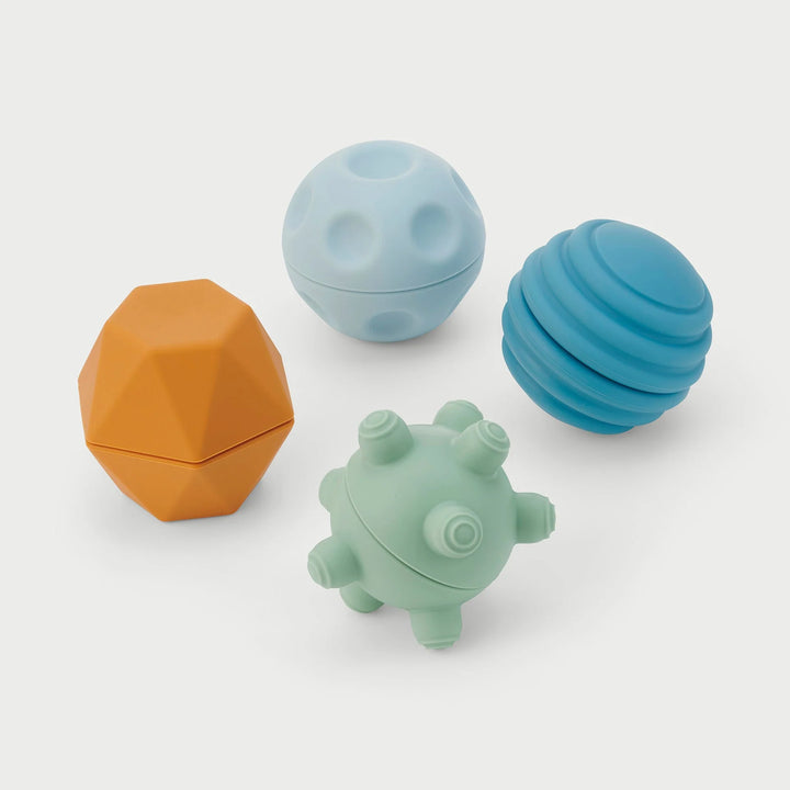 Set van 4 neutraal gekleurde Tickit sensorische silicone ballen met textuur