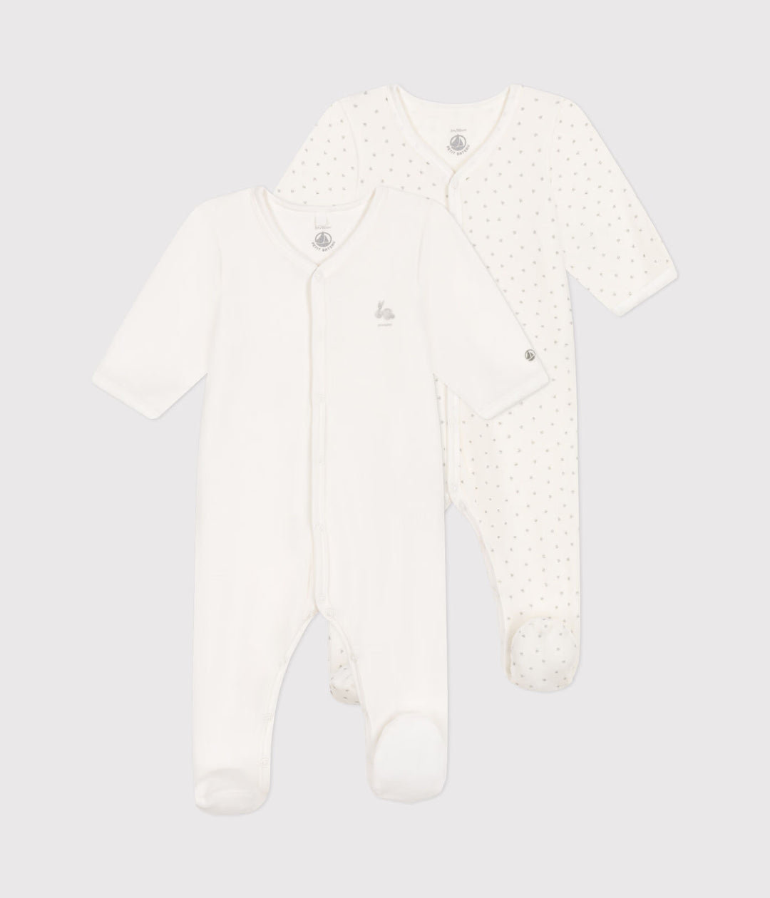 Set van 2 Petit Bateau baby pyjama’s met voetjes en drukknoopjes