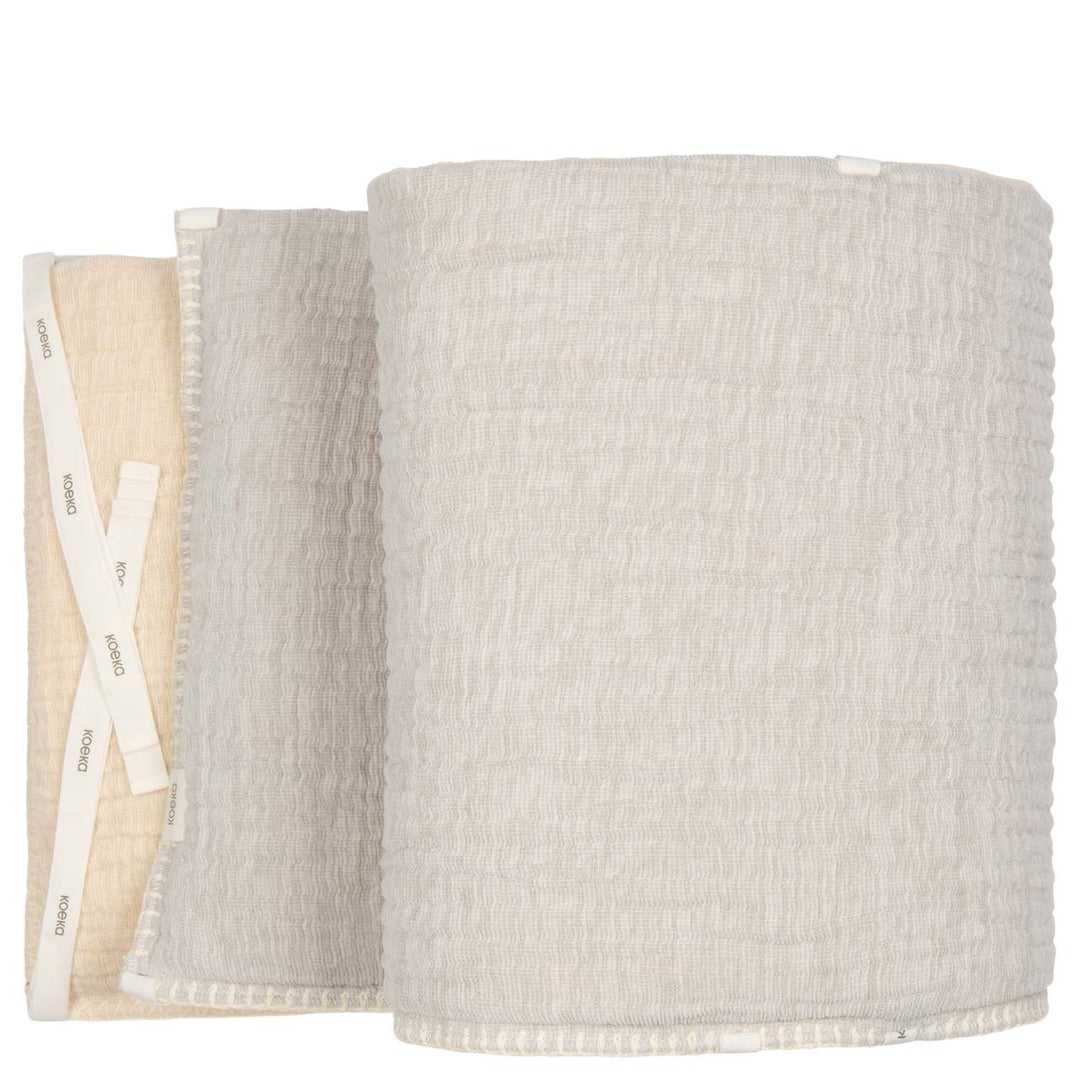 Koeka boxbumper Rivoli in stone/warm white van zachte chenille