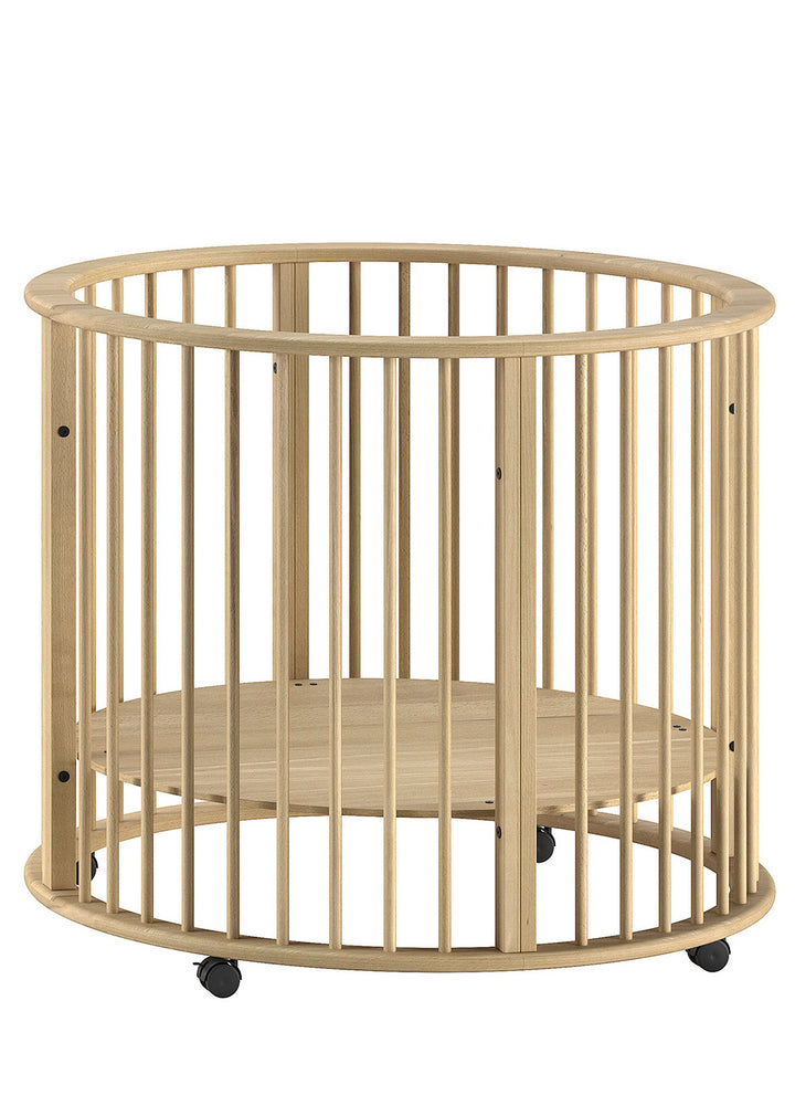 Jaxx Dino rond babypark Ø 90 cm in natuurlijke houtkleur met verstelbare bodem en wieltjes.