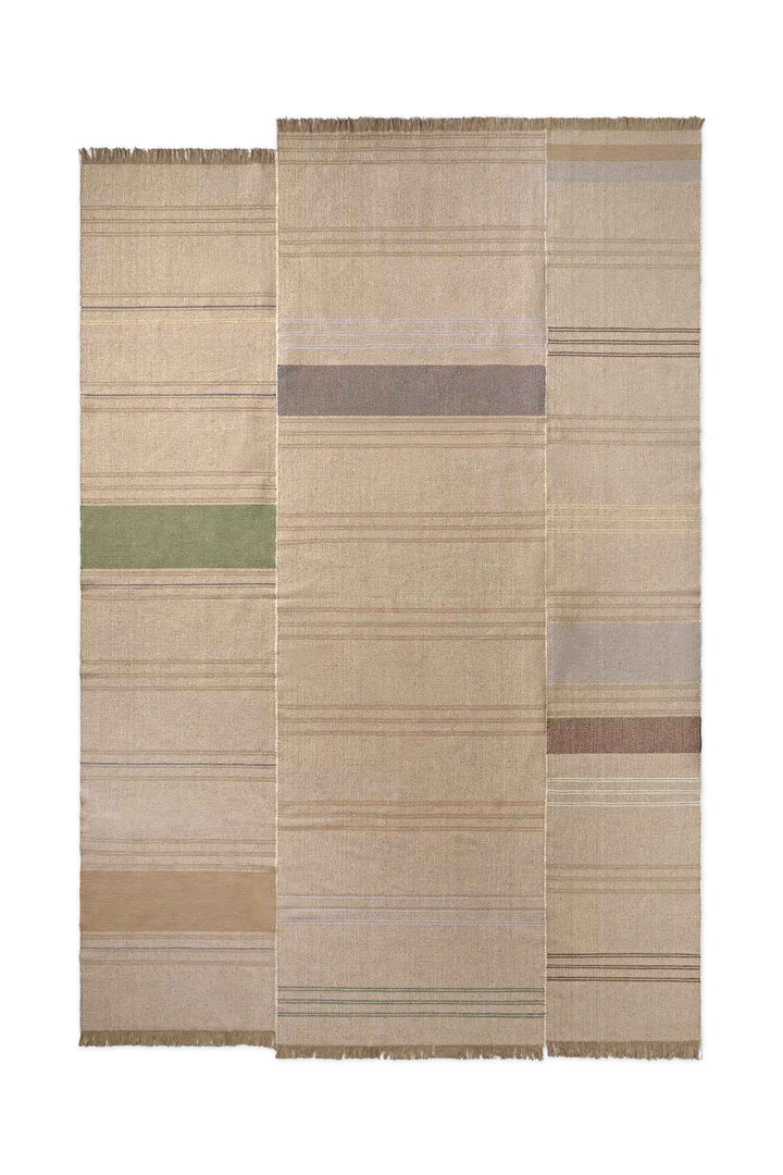 Lorena Canals Oaxaca handgeweven tapijt 200x300 cm in beige en multicolor met franjes en rijke texturen.