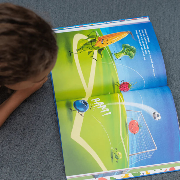 Boek "De Beste" van Hongry met Barry de blauwe bes die leert over doorzetten en zelfvertrouwen