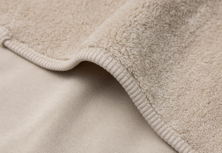 Jollein wiegdeken Basic Jersey Sherpa 75x100cm in Warm Sand