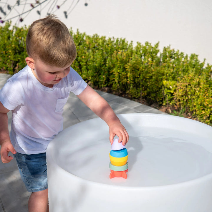 Stapelbare Tickit raket in regenboogkleuren met zes silicone delen