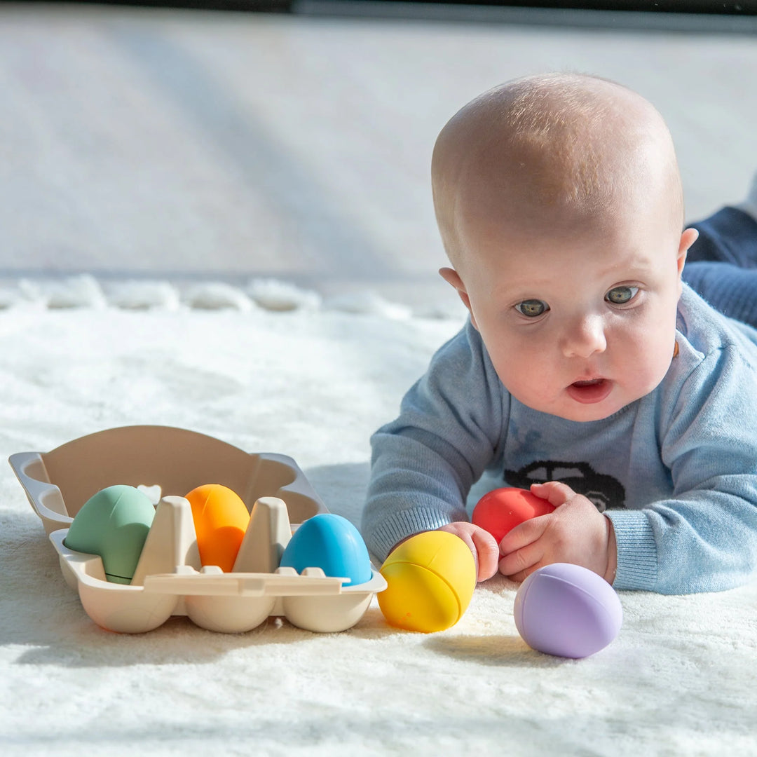 Regenboogkleurige silicone sensorische eieren met eierdoos van Tickit