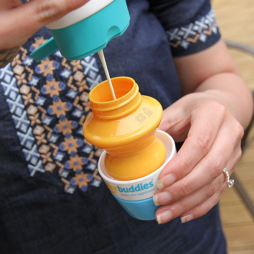 Herbruikbare roze zonnecreme applicator Solar Buddies