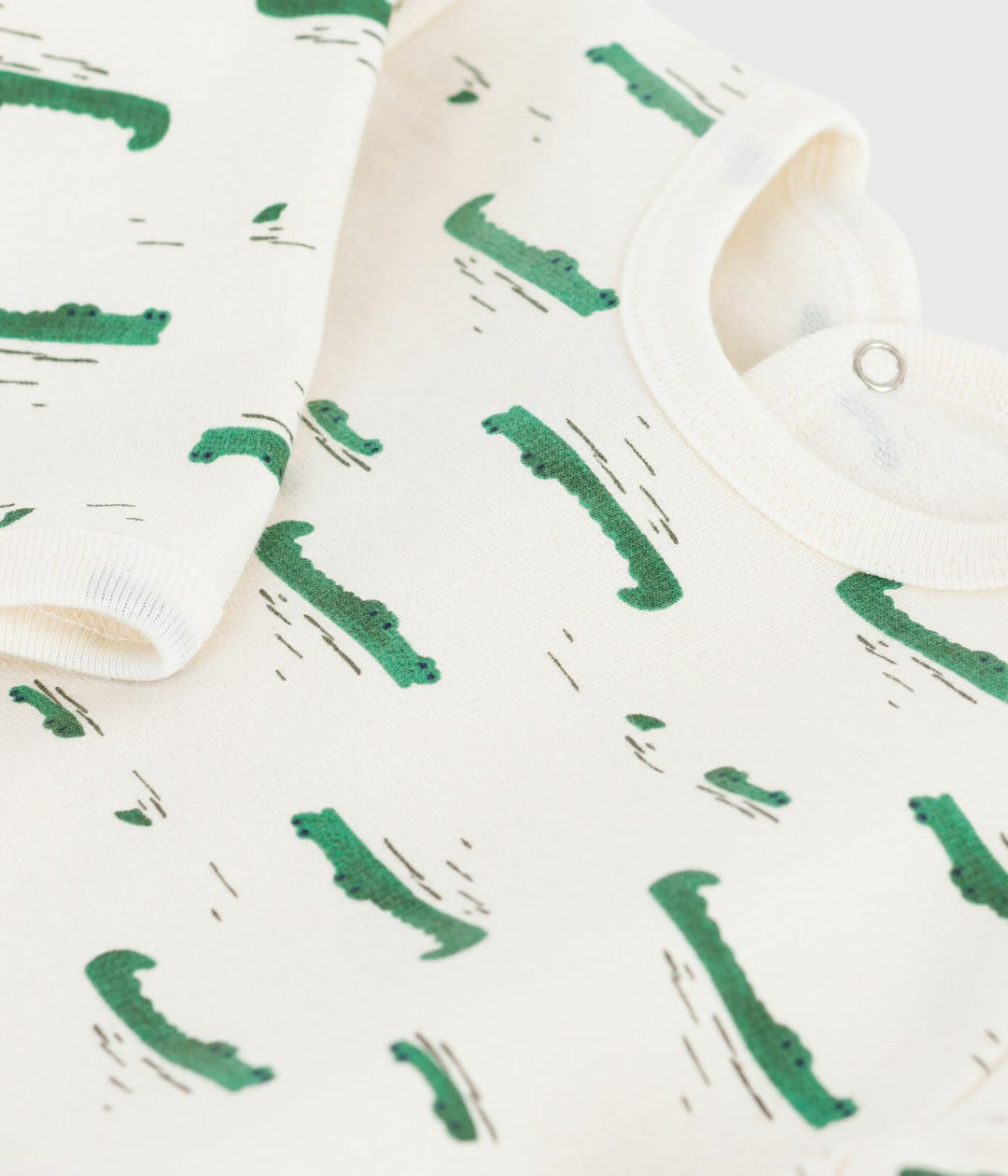Petit Bateau pyjama met krokodillenprint in Milk / Multico