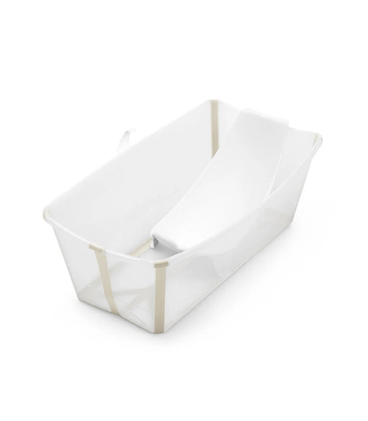 Stokke® Flexi Bath® in Transparent Sandy Beige, opvouwbaar babybadje met anti-slip bodem en warmtegevoelige badstop