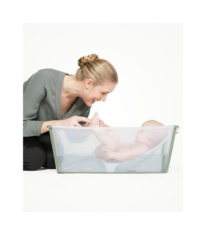 Stokke® Flexi Bath® in Transparent Green, opvouwbaar babybadje met anti-slip bodem en warmtegevoelige badstop