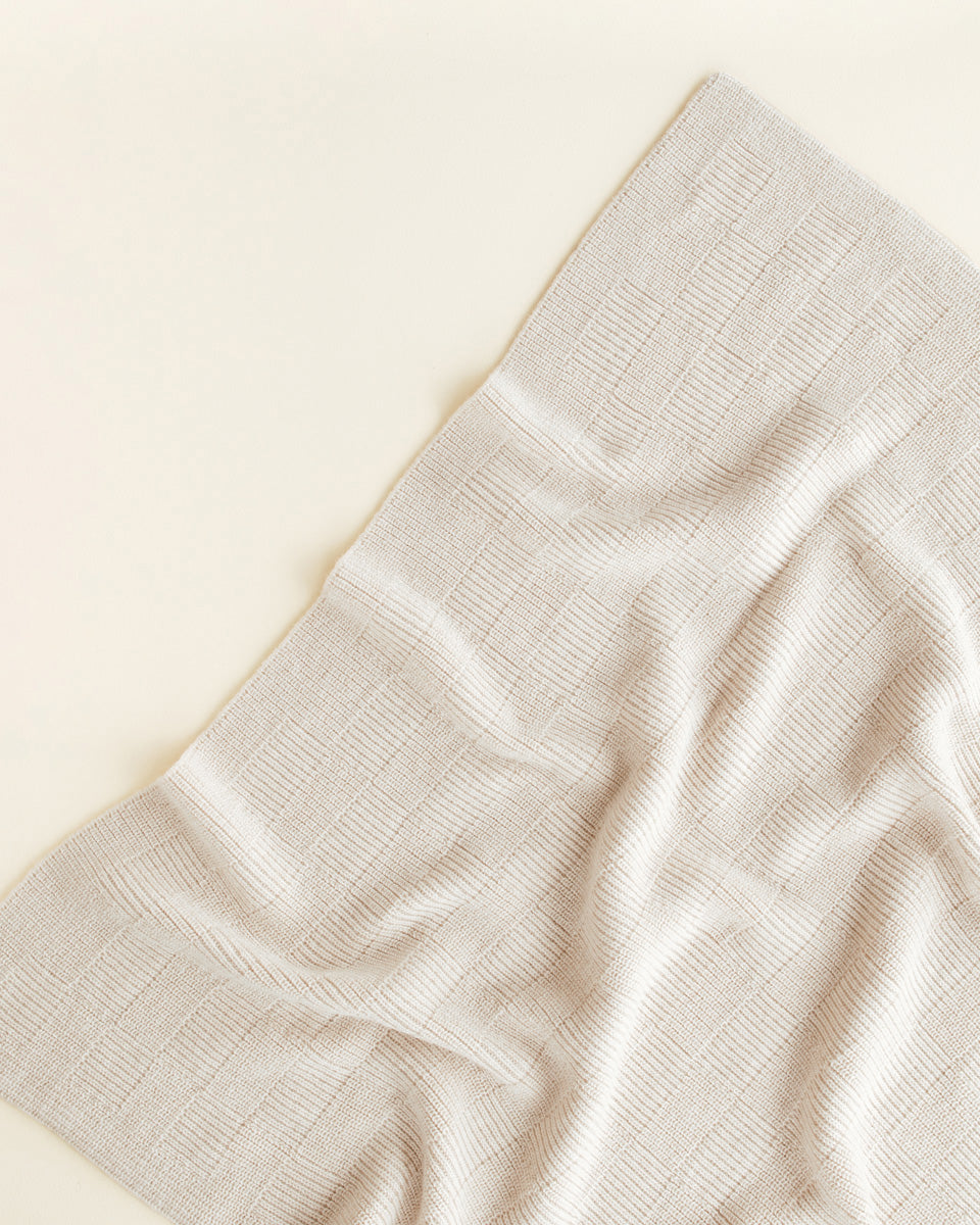 Hvid Ivy deken in Cream met geribbelde structuur, 70 x 95 cm