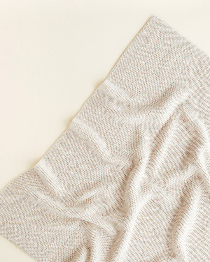 Hvid Ivy deken in Cream met geribbelde structuur, 70 x 95 cm
