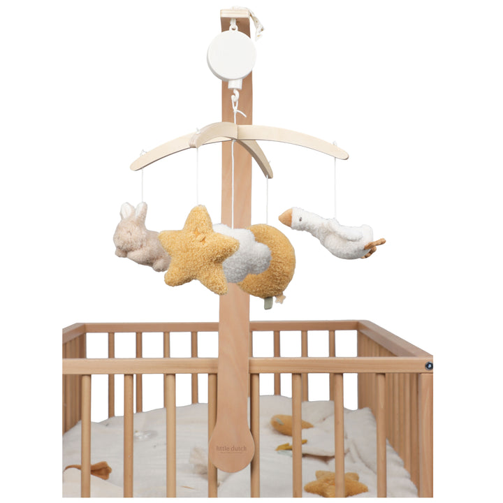 Houten muziekmobiel Newborn Naturals van Little Dutch boven wiegje in neutrale kleuren