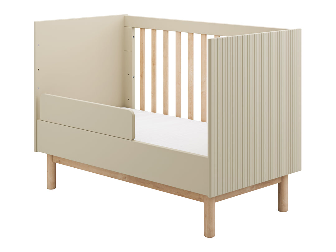 Champagne Pinio Miloo babybed met afneembare zijde en geribbelde panelen
