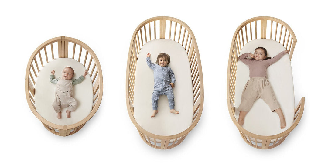 Stokke Sleepi V3 Bedverlenging in natural finish, transformeert Mini wieg naar ledikant, gemaakt van FSC®-gecertificeerd beukenhout.