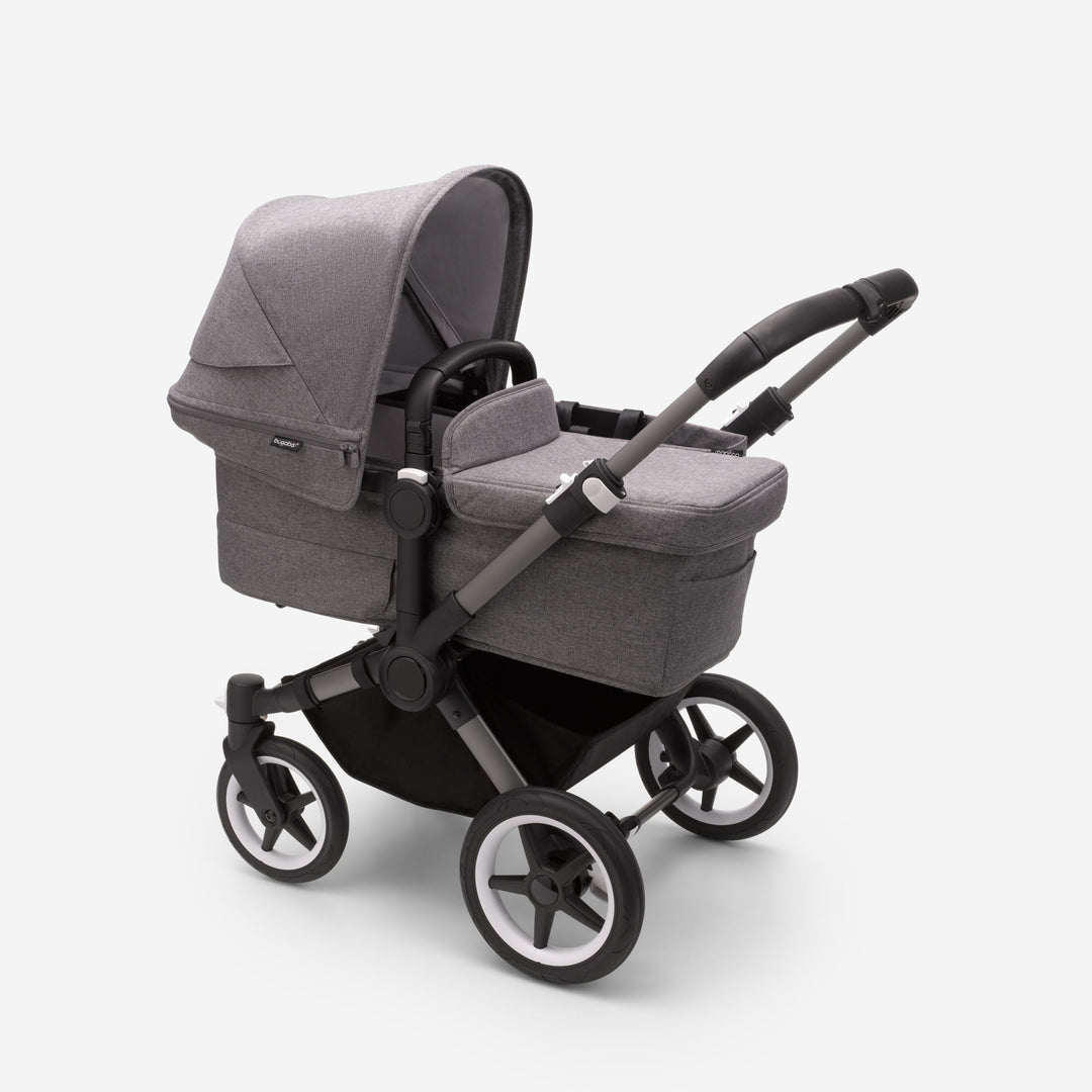 Bugaboo Donkey5 Mono kinderwagen in Graphite / Grey Melange, om te vormen tot duo kinderwagen, met ruime opbergcapaciteit en UPF 50+ zonnekap.