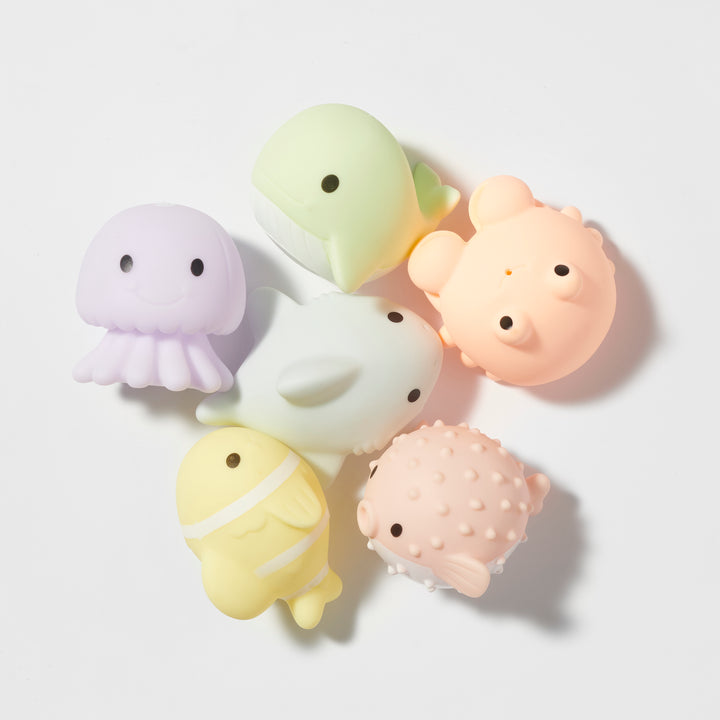 Set van zes Sunnylife badspeeltjes in de vorm van zeedieren in pastelkleuren