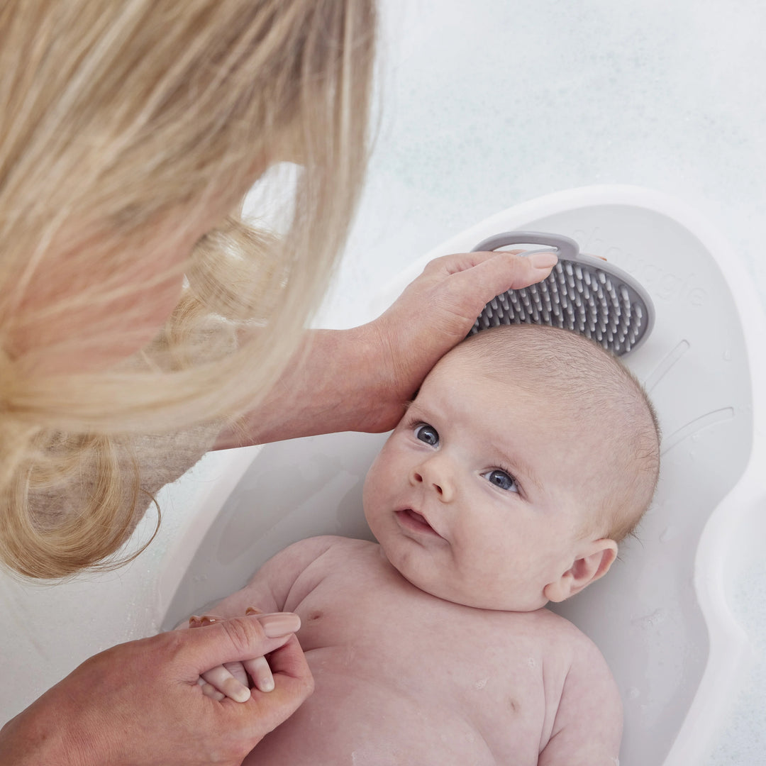 Shnuggle badsteun voor pasgeborenen in wit en grijs, ergonomisch en antislip