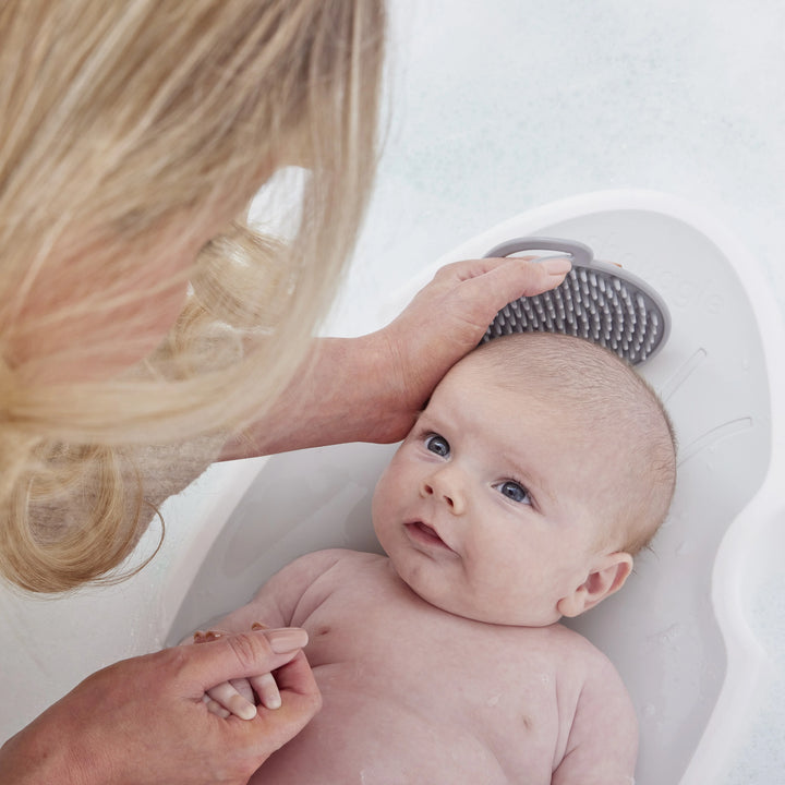 Shnuggle badsteun voor pasgeborenen in wit en grijs, ergonomisch en antislip