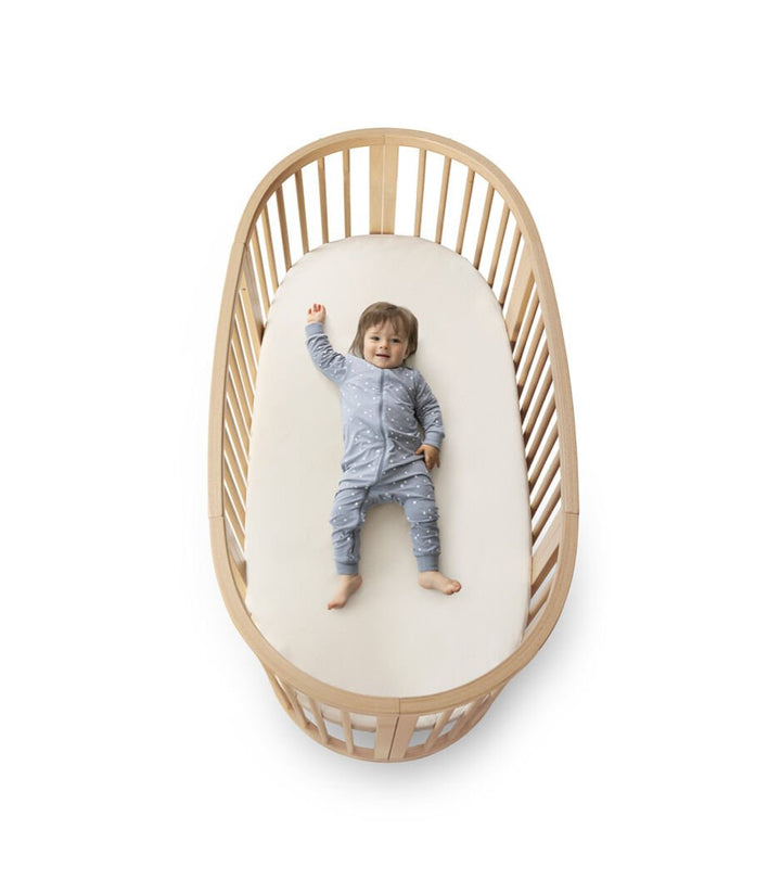 Stokke Sleepi V3 Bedverlenging in natural finish, transformeert Mini wieg naar ledikant, gemaakt van FSC®-gecertificeerd beukenhout.