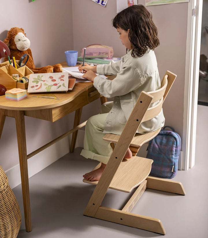 Stokke Tripp Trapp Natural kinderstoel in Scandinavisch design, verstelbaar en duurzaam.