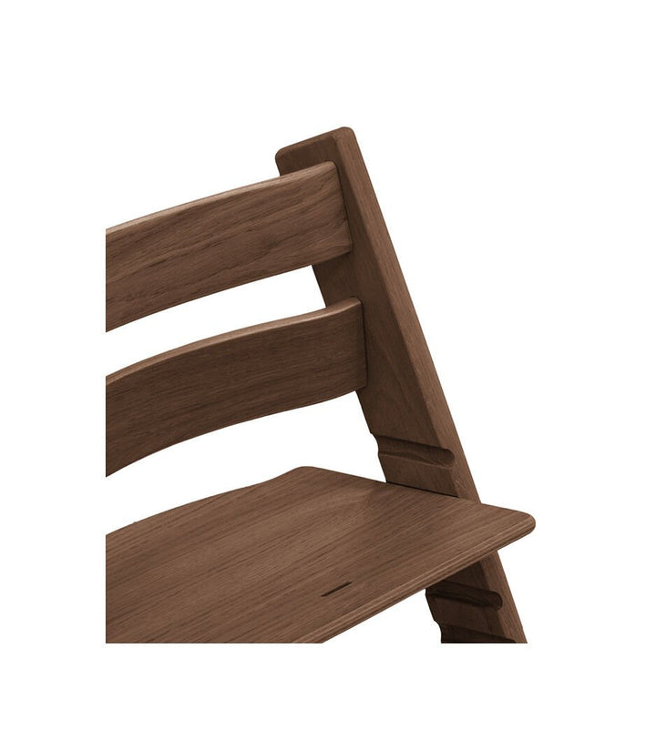Stokke Tripp Trapp Oak Warm Brown kinderstoel in Scandinavisch design, verstelbaar en duurzaam.