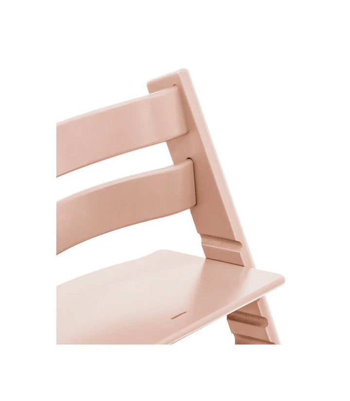 Stokke Tripp Trapp Serene Pink kinderstoel in Scandinavisch design, verstelbaar en duurzaam.