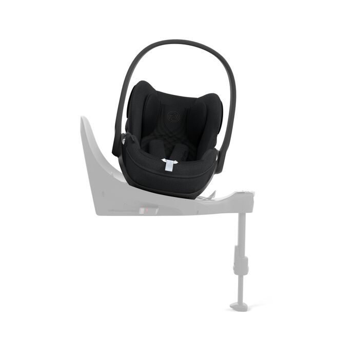 Cybex Cloud T i-Size baby-autostoel in zwart, getoond in liggende positie met ISOFIX basis.