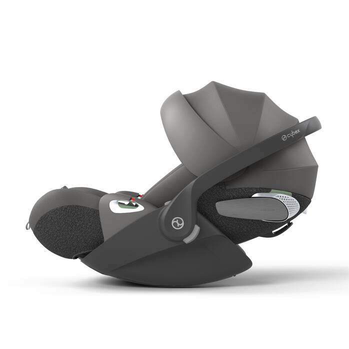 Cybex Cloud T i-Size baby-autostoel in mirage grey, getoond in liggende positie met ISOFIX basis.